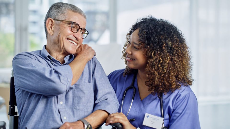 care staff with senior man